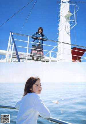A young woman wearing a skirt and a denim jacket.