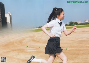 A woman in a school uniform holding a baseball glove.